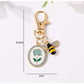 Keypus alloy keychain showing the keyring and flower print pendant