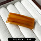 Beau curved bar hair clip positioned diagonally on white surface