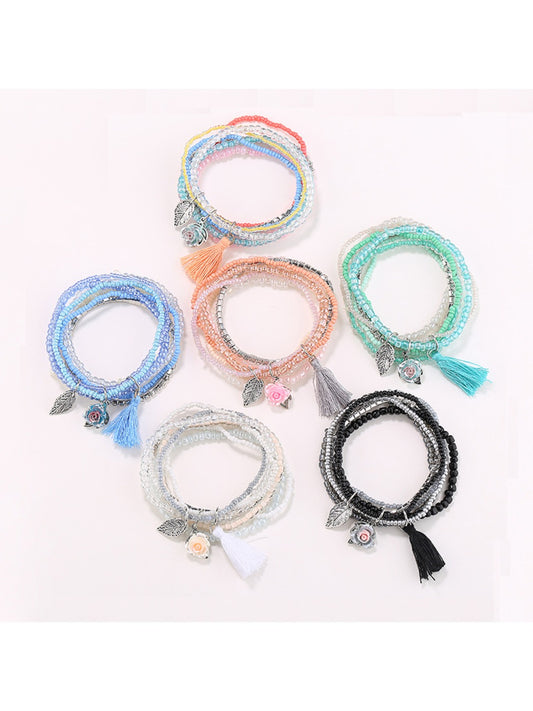 Lovra tassel multi-row beaded bracelet with colorful beads and a pink tassel