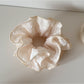 Gifty Sweet Style floral print scrunchie styled in a ponytail with pink and white floral details