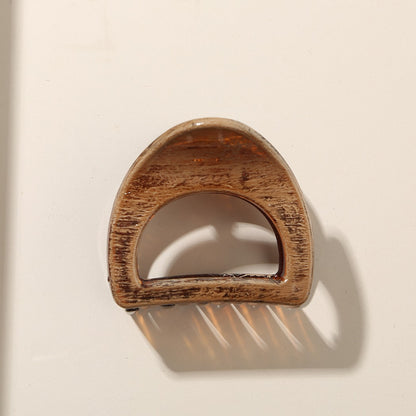 Beau - Glossy PS Curved Hollow Design Claw Clip