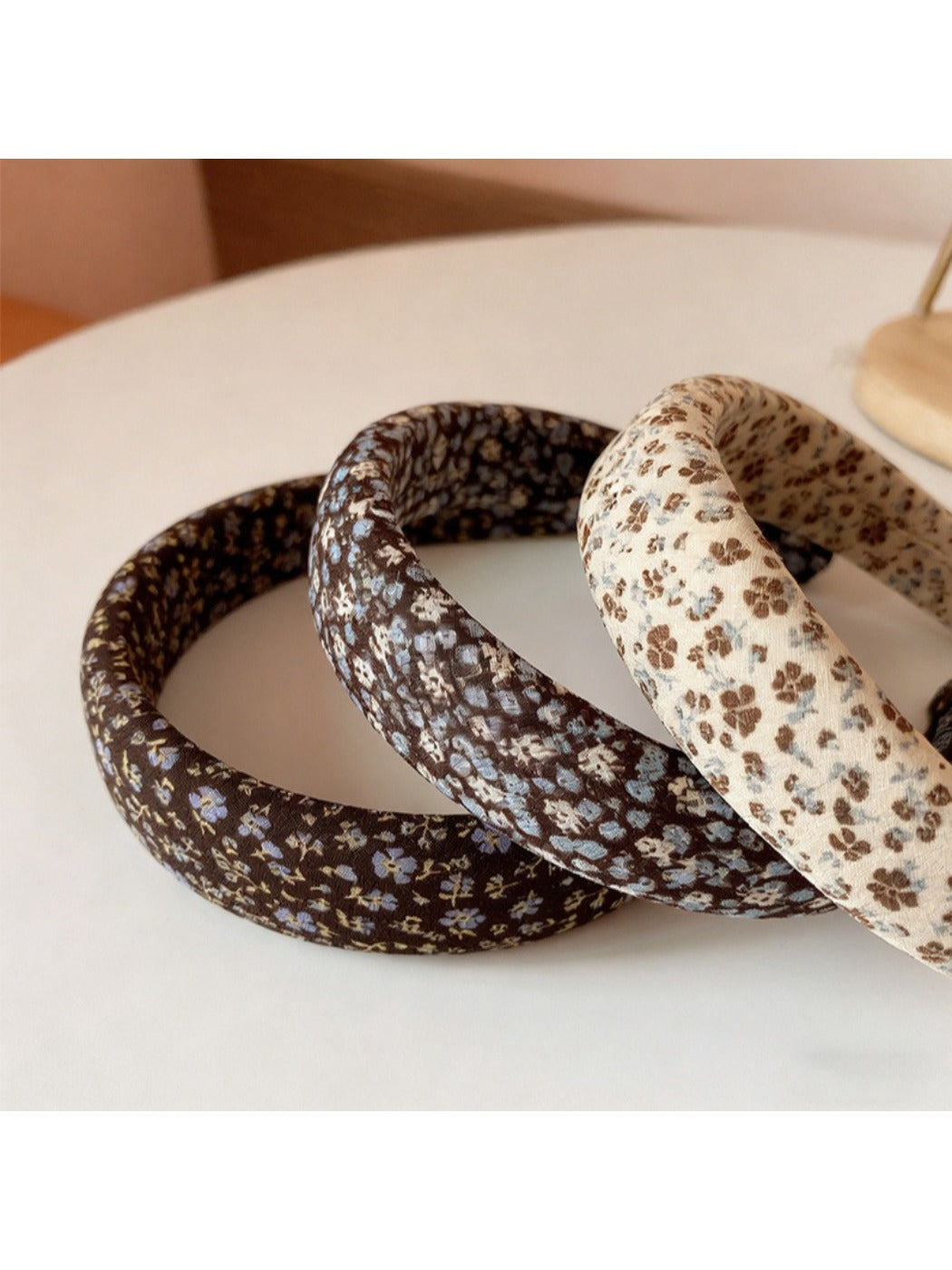 Gifty headband worn by a model with long hair styled back