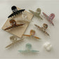 Beau acetate gradient color claw clip on white background showing full clip shape