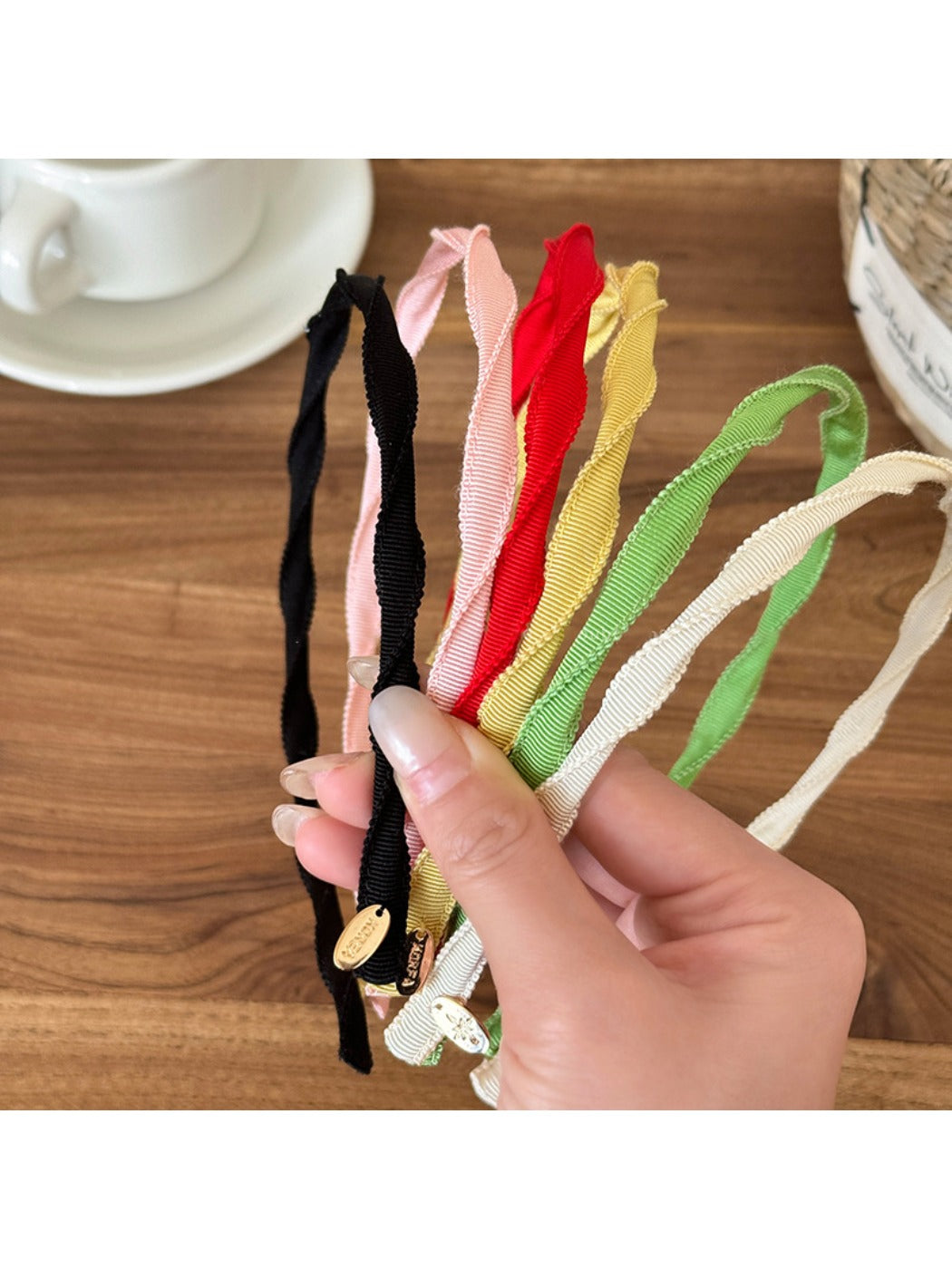 Close-up of Gifty headband showing smooth fabric texture and simple design