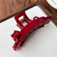 Beau acetate claw clip shown from above, emphasizing cat face design