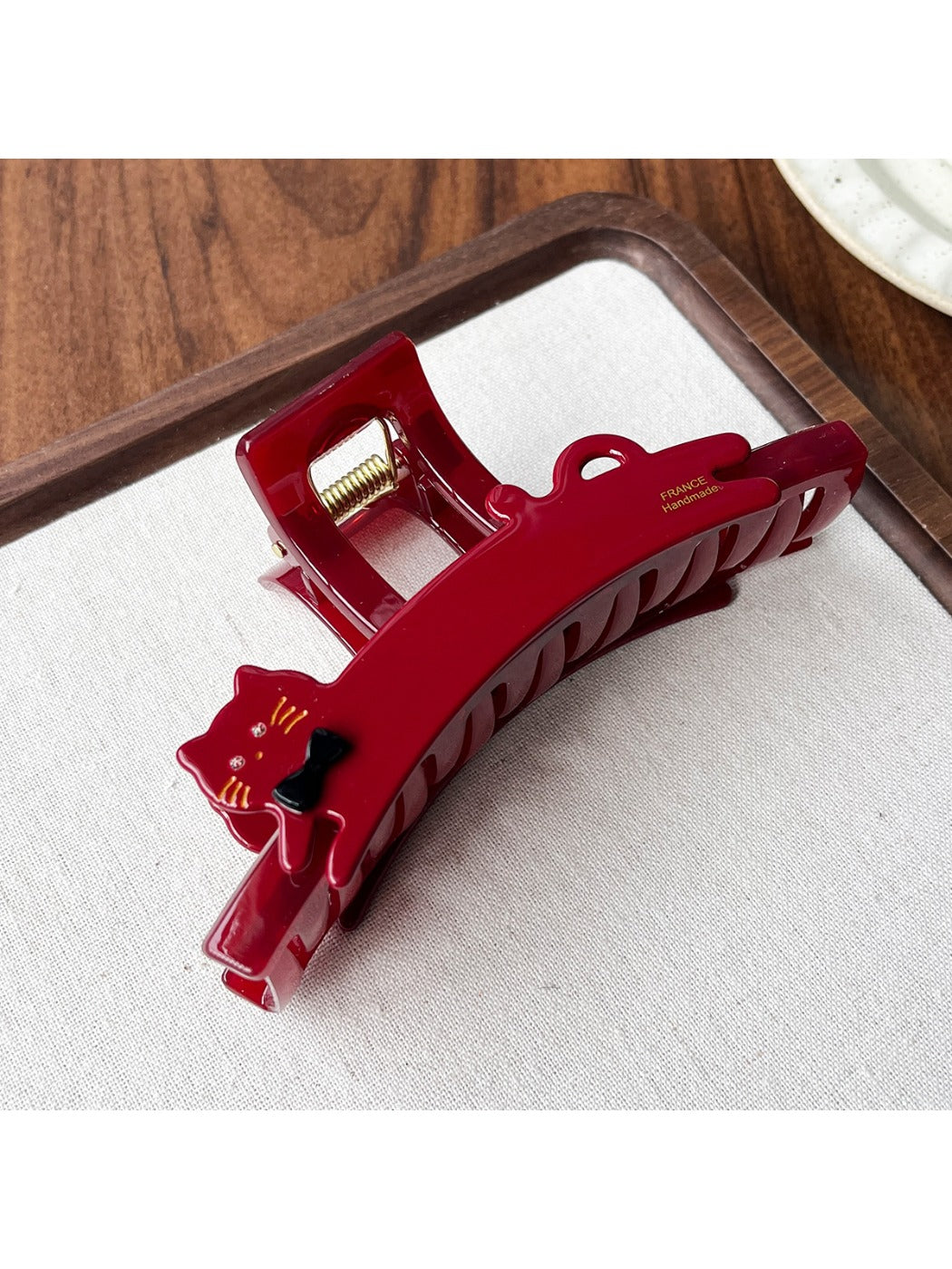 Beau acetate claw clip shown from above, emphasizing cat face design