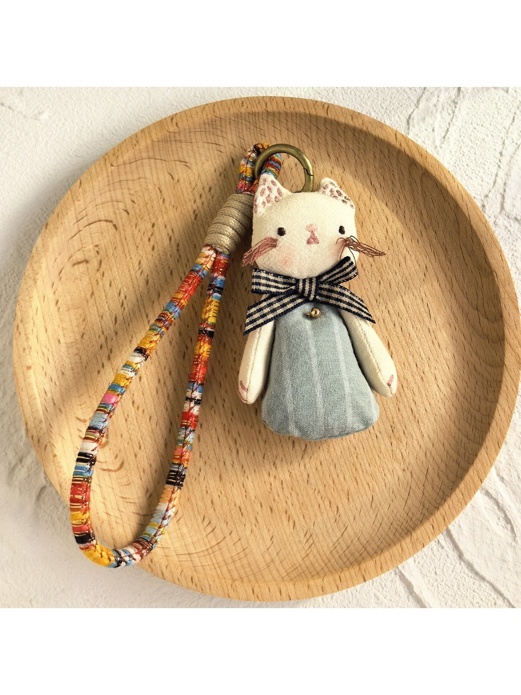 Keypus cartoon doll keychain with bright colors and embroidered details