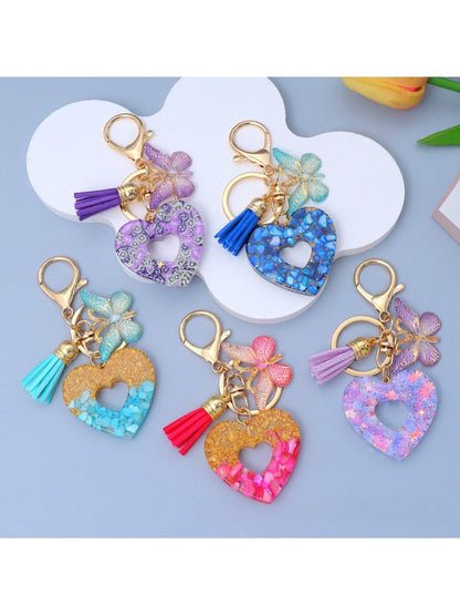 Keypus keychain with heart-shaped cutout hanging from a keyring