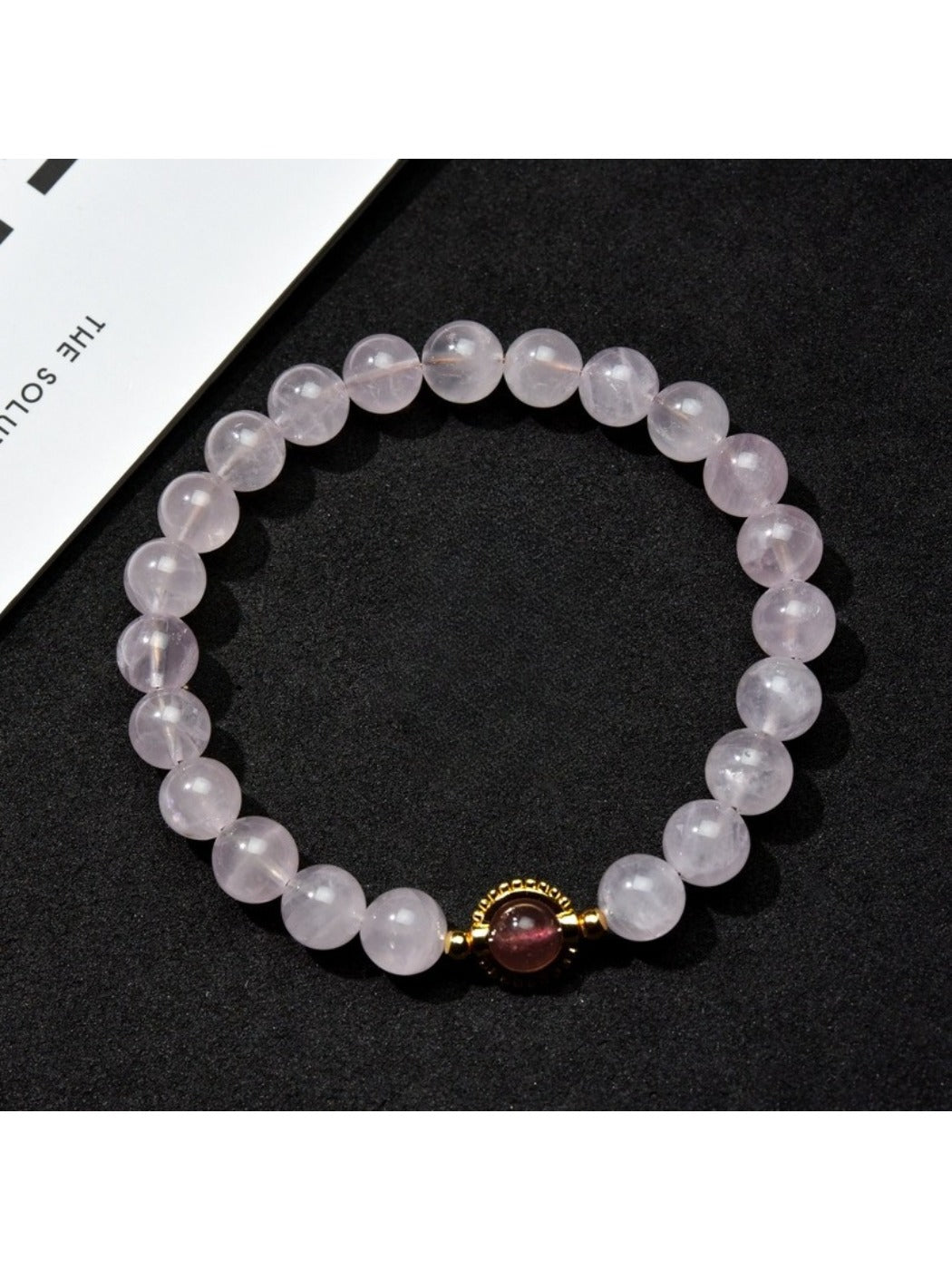 Side view of Lovra pastel beaded bracelet highlighting bead texture and color variation