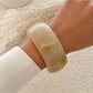 Lovra minimalist round bangle bracelet shown in a gift box with elegant packaging