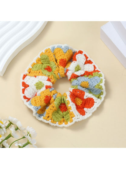 Scrunchie styled on a wrist as a colorful accessory