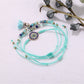 Lovra small bead tassel alloy bracelet shown with clasp and bead details