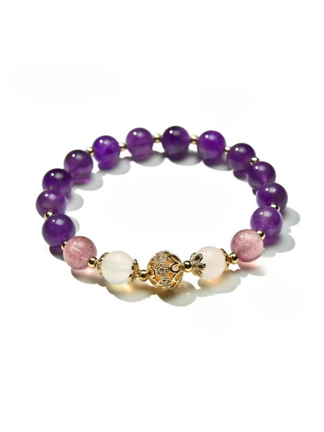 Lovra vintage purple beaded bracelet arranged in a circular shape on a flat surface