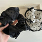 Gifty bow tulle scrunchie displayed on a wooden surface showing texture and bow detail