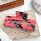 Beau hair claw clip with crow design, viewed from top angle