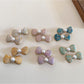 Beau sweet cute bow shaped hair clip in soft pink fabric