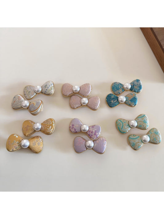 Beau sweet cute bow shaped hair clip in soft pink fabric