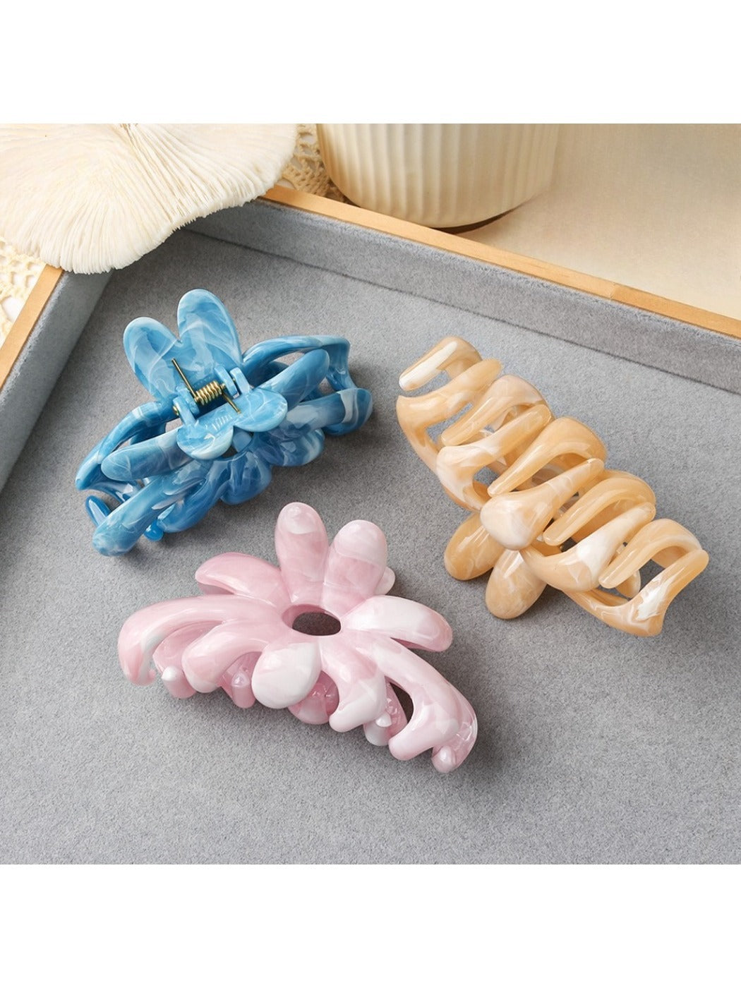 Close-up of Beau hair clip showing textured flower petals