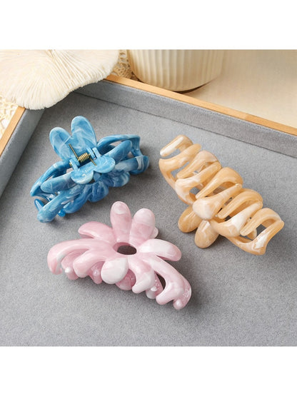 Close-up of Beau hair clip showing textured flower petals