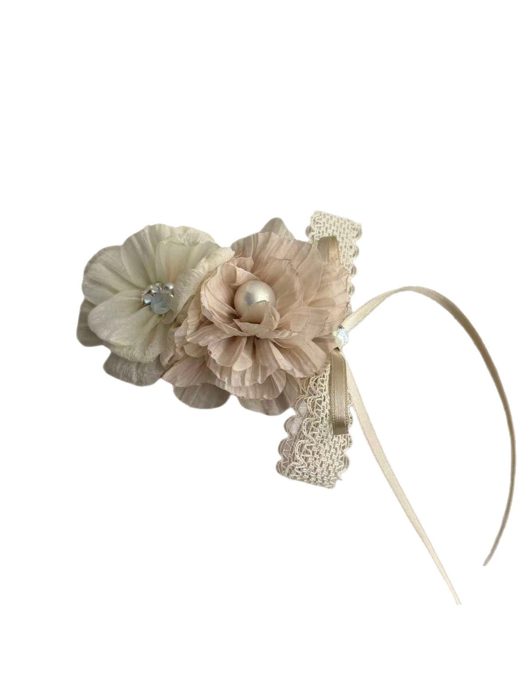 Close-up of white floral hair clip showing petal texture and clip mechanism