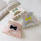 Beau hair claw clip held in hand highlighting size and lightweight design