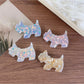 Beau acetate hair clip shaped like a sitting puppy with detailed ears and tail