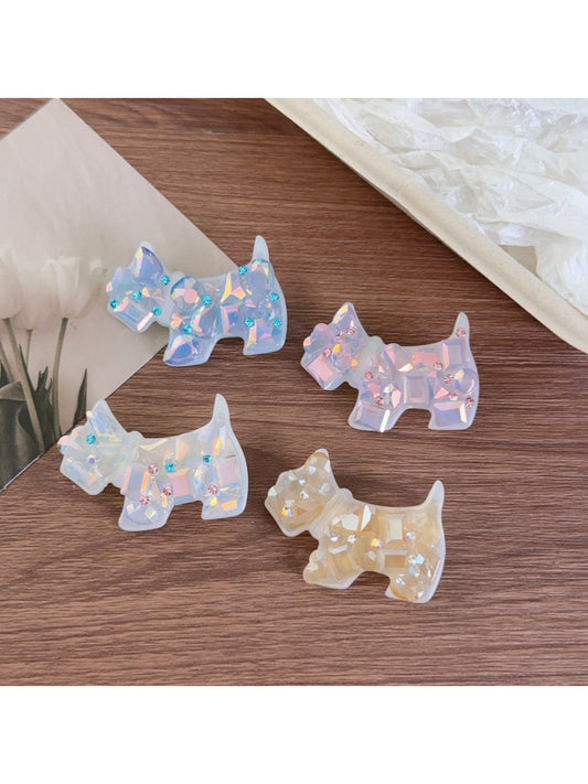 Beau acetate hair clip shaped like a sitting puppy with detailed ears and tail