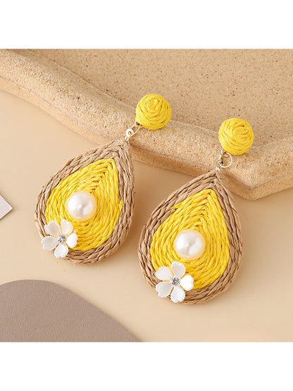 Earedge chic teardrop drop earrings photographed with soft shadows