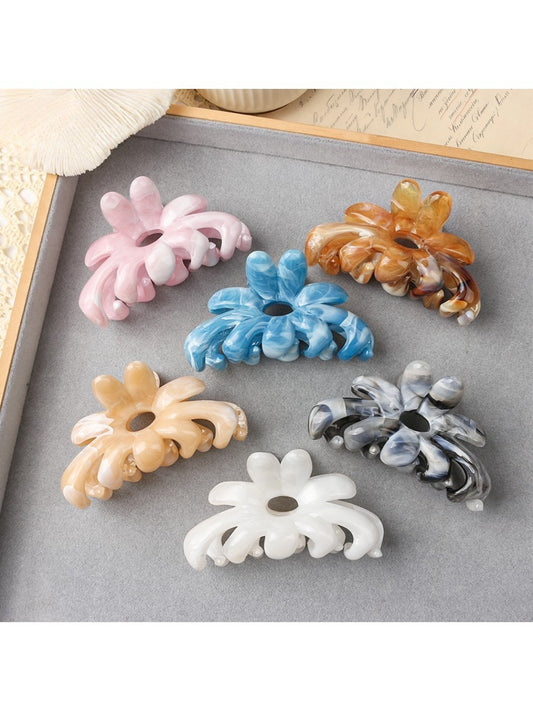 Beau flower shaped hair clip in soft pink with petal details