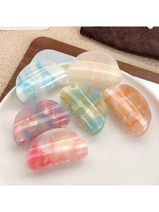 Beau colorful semi circular hair claw clip on white background