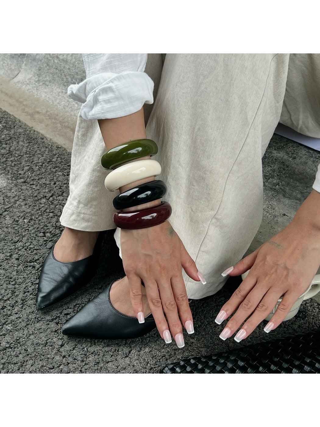 Close-up of Lovra open cuff bracelet showing smooth matte texture