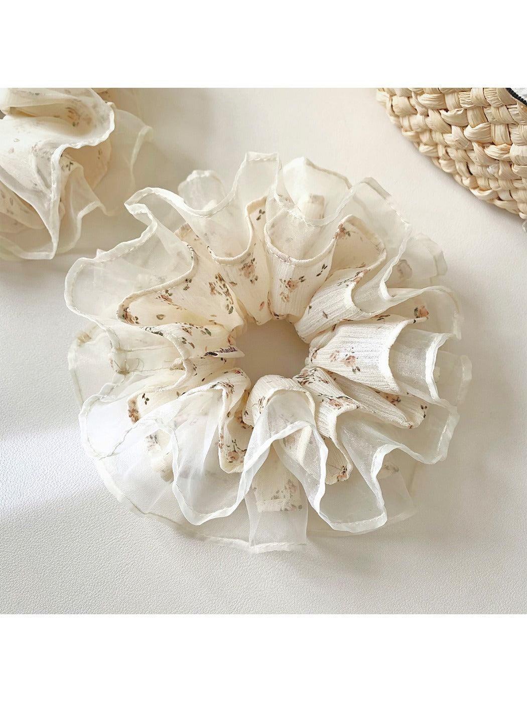 Gifty tulle ruffle scrunchie with pink and white floral print on sheer fabric