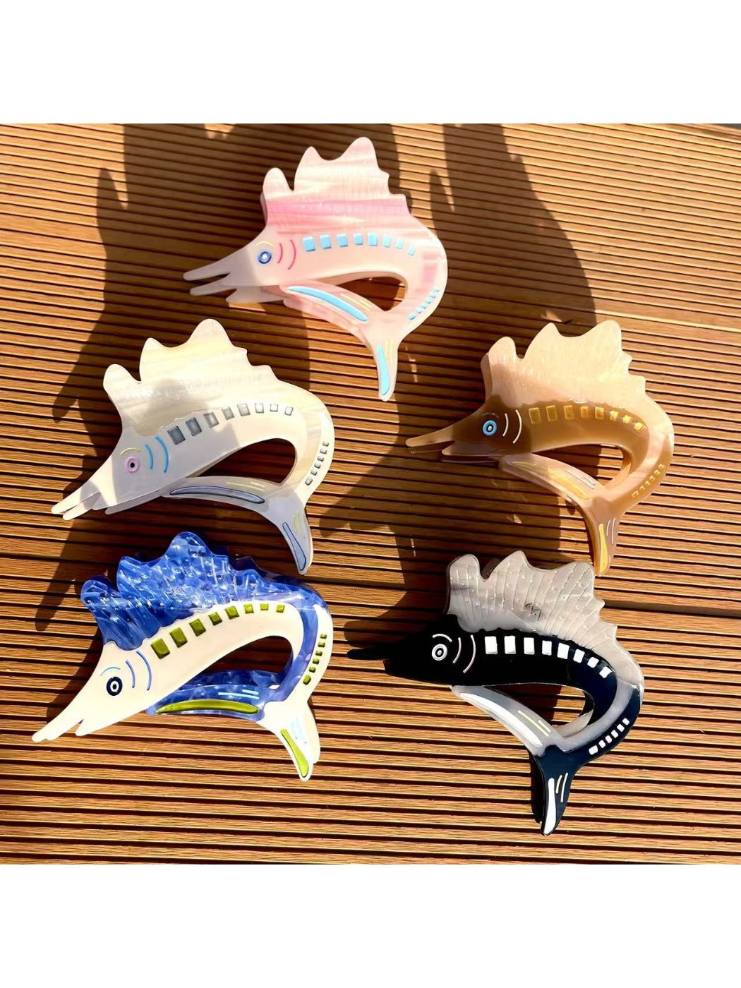 Close-up of Beau sturgeon claw clip showing textured surface and curved claws