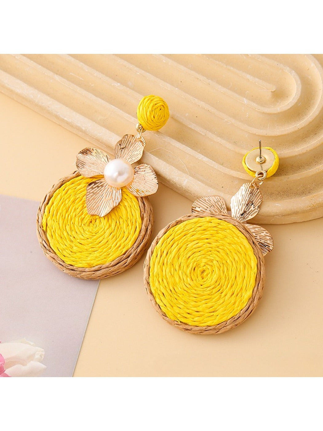 Earedge floral drop earrings displayed on a white background showing circular design