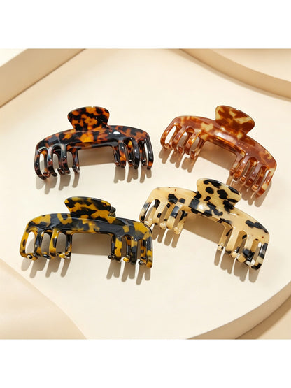 Beau chic soft acetate claw clip in tortoiseshell pattern on white background