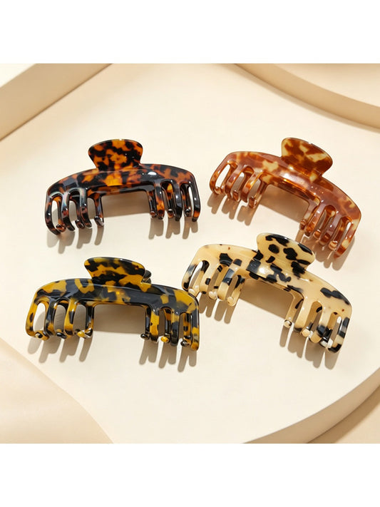 Beau chic soft acetate claw clip in tortoiseshell pattern on white background