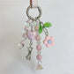 Keypus heart charm keychain showing detailed beadwork and gold keyring