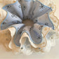 Model wearing Gifty bow print ruffled scrunchie in her hair, styled in a ponytail