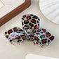 Beau hair claw clip displayed with other hair accessories