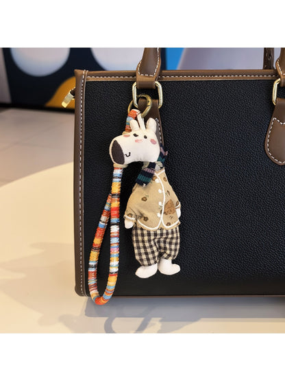 Close-up of the giraffe charm's face and neck details