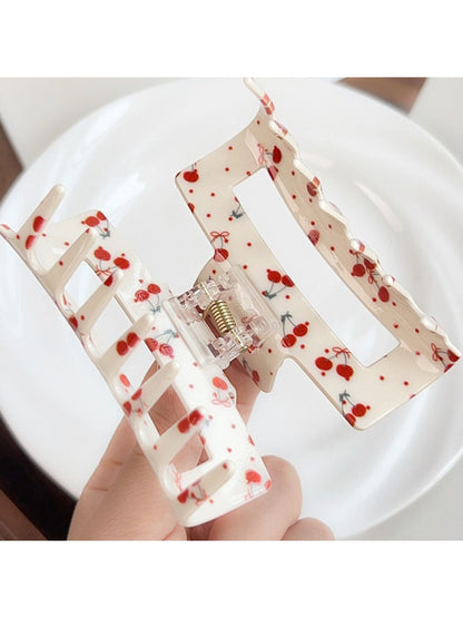 Beau floral print square hair claw clip holding hair in a half-up style