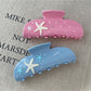 Side view of Beau starfish half round hair claw clip highlighting curved design