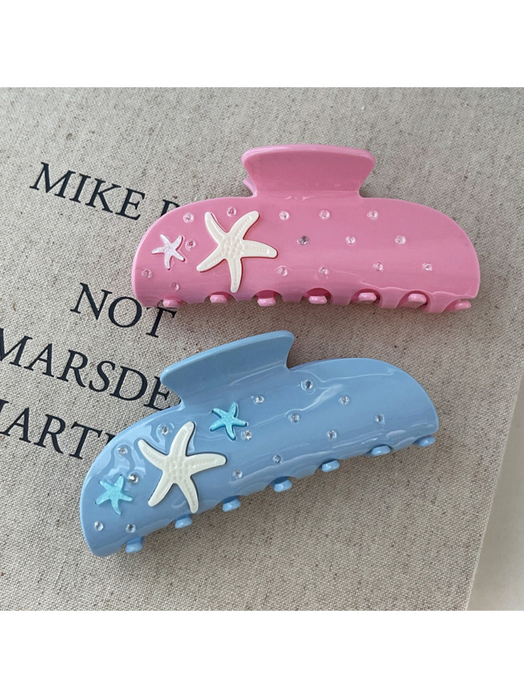 Side view of Beau starfish half round hair claw clip highlighting curved design