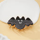 Close-up of Halloween bat hair clip showing textured wing design