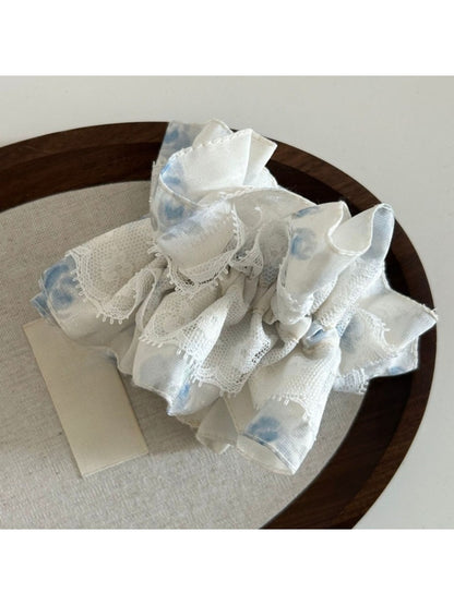 Gifty Sweet Lace Tiny Floral Scrunchie folded to display lace trim and floral design