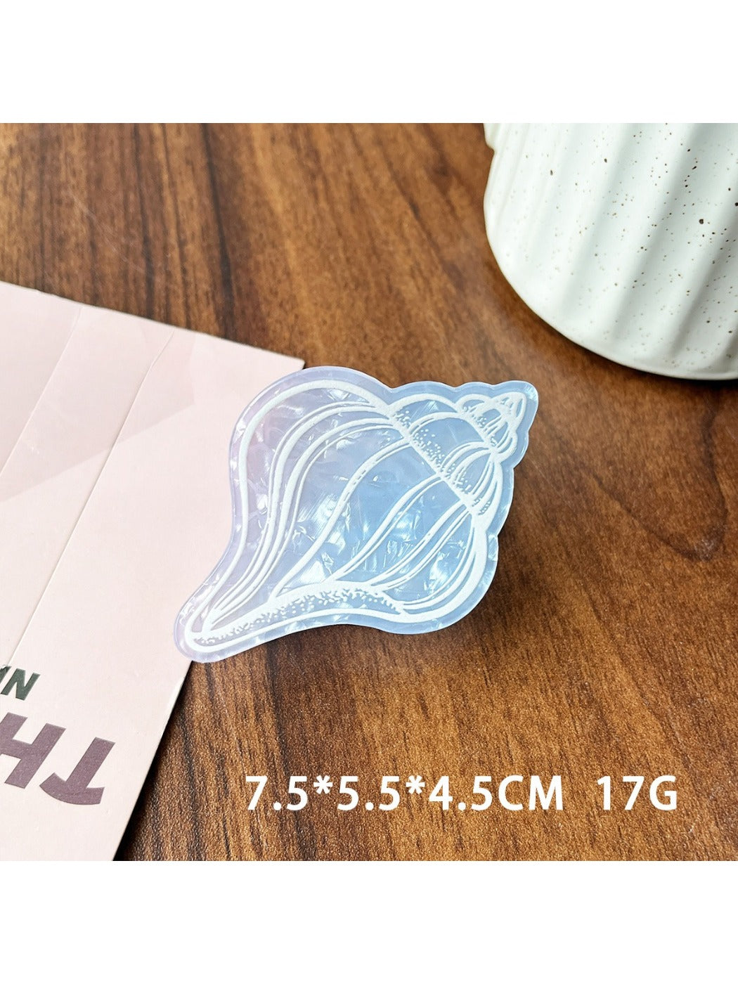 Beau blue ocean style claw clip with light reflection emphasizing smooth texture