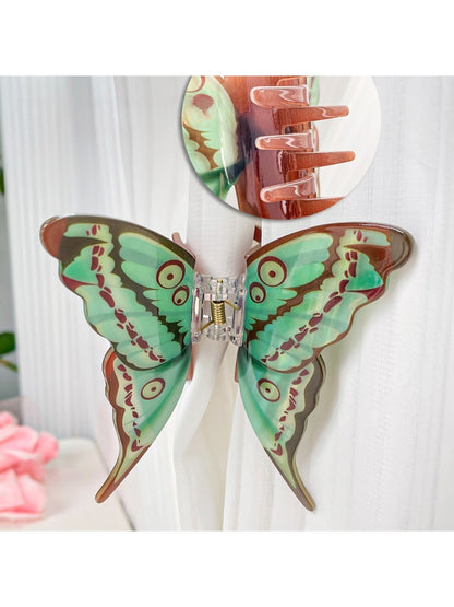Beau butterfly hair claw clip on white background showing full profile