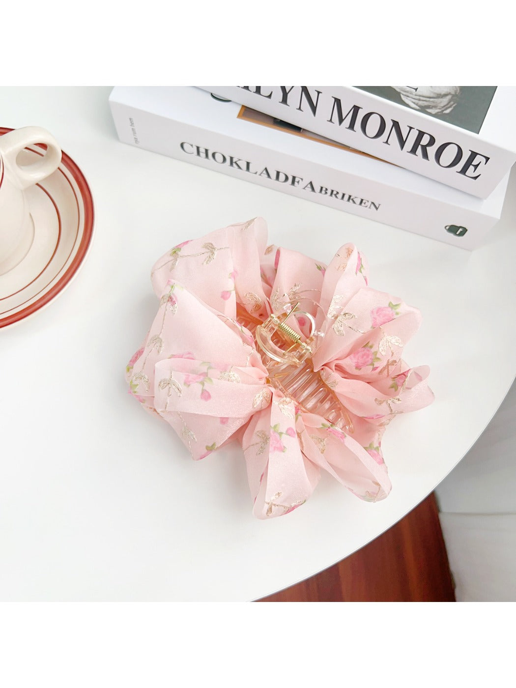 Top view of Beau floral print hair claw clip emphasizing shape and colors