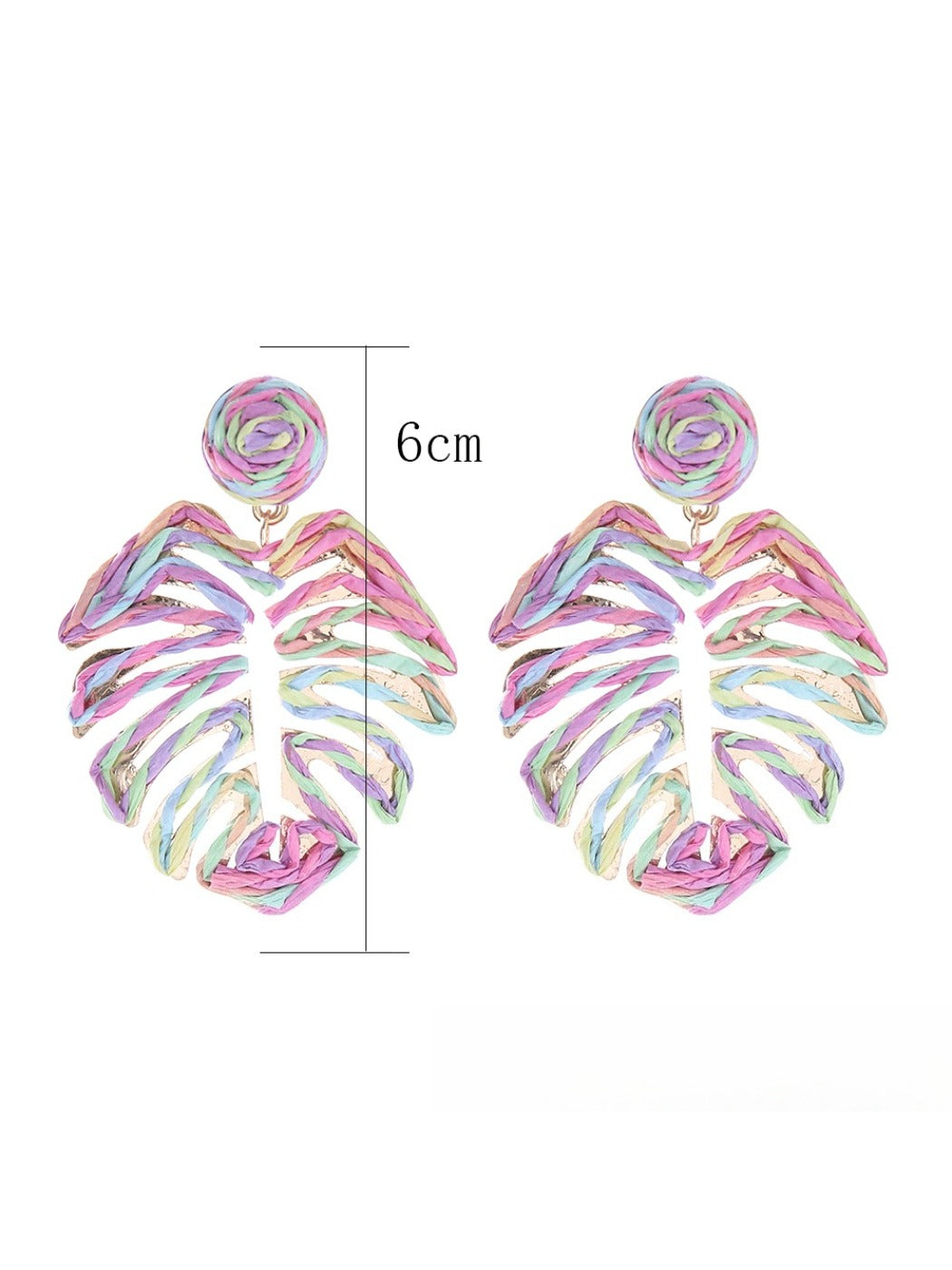 Pair of raffia woven hollow leaf shaped earrings displayed on a flat surface