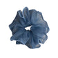 Close-up of blue plaid tulle scrunchie showing fabric details
